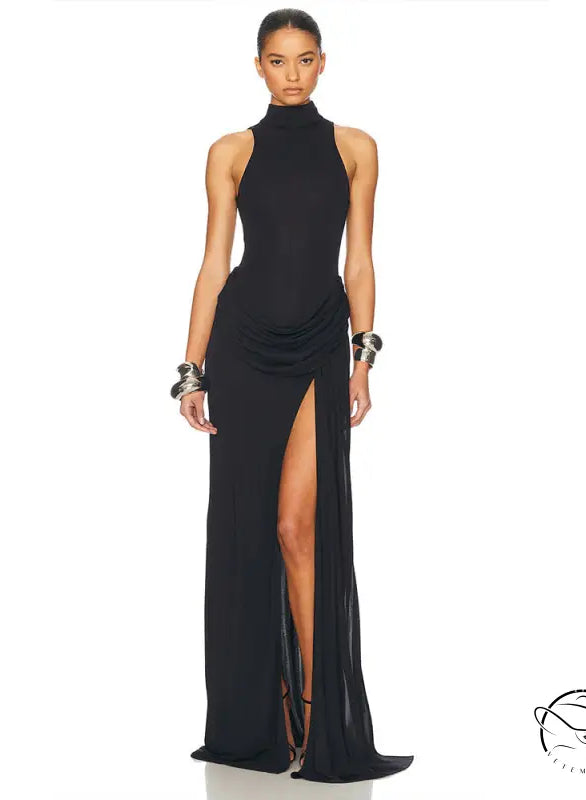 Black halter neck gown with high split and tight waist ruched detail