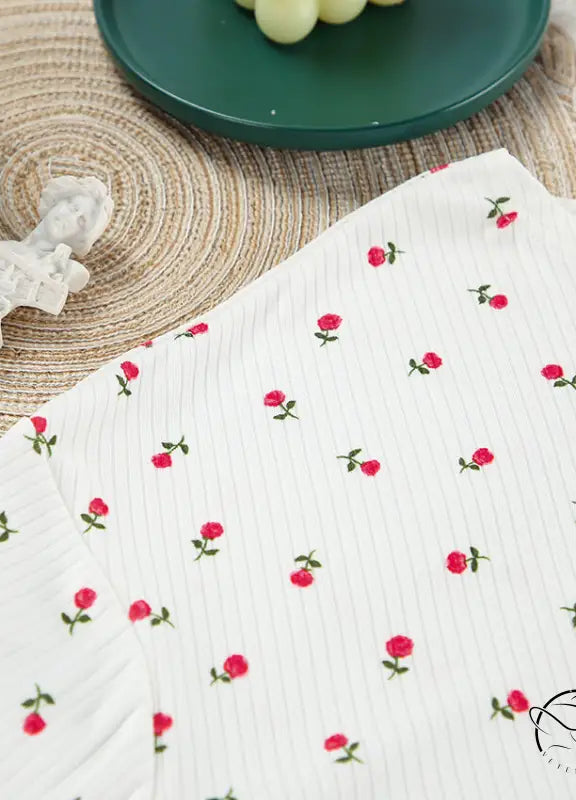 White ribbed langry cardigan with red rose embroidery