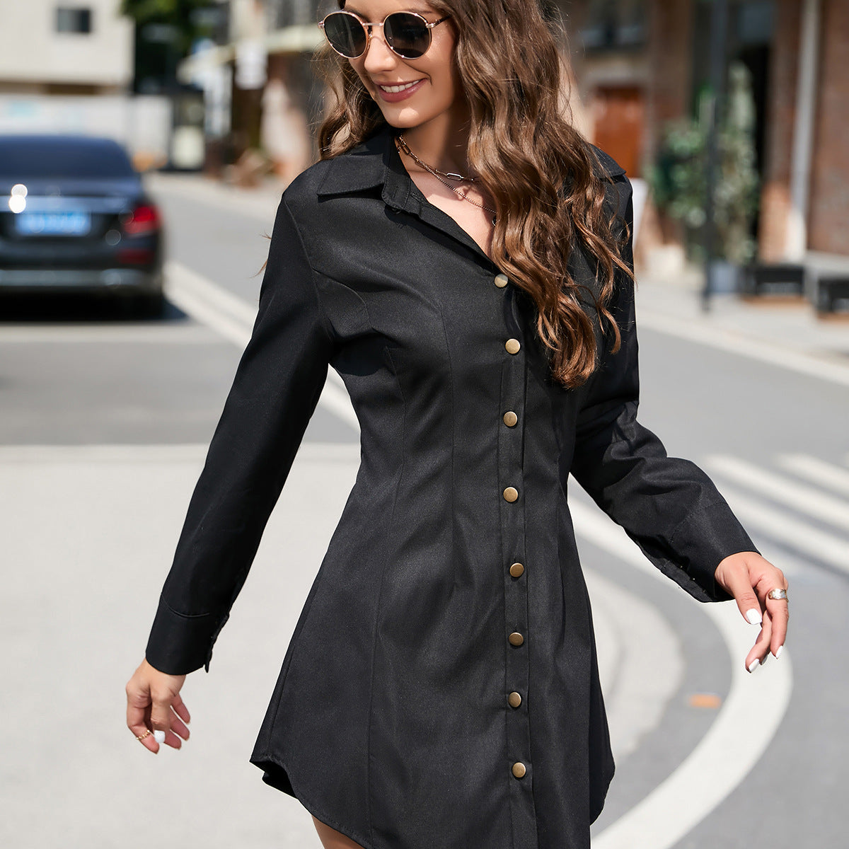 Black button-down long sleeve dress showcasing elegant fashion in the Beautiful Short Long Sleeve Dress