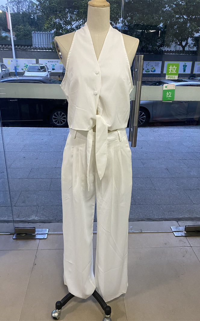 Elegant office jumpsuit set with white halter top and pants for stylish fashion and ملابس