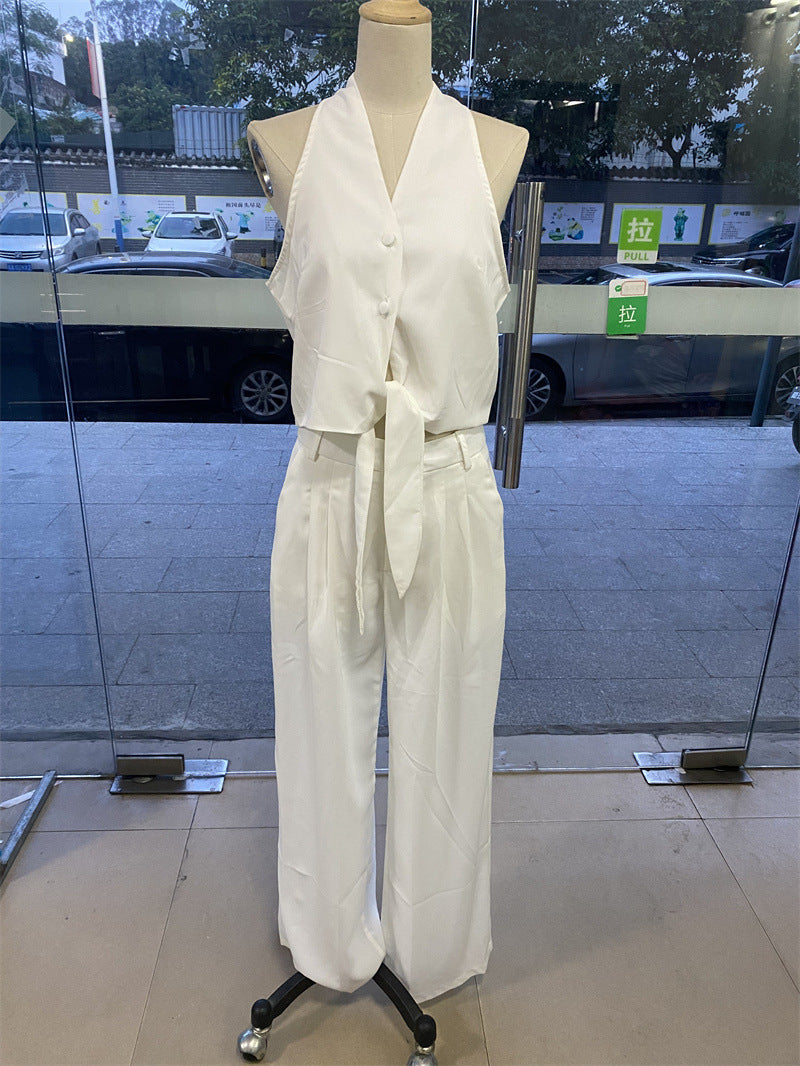 Elegant office jumpsuit set with white halter top and pants for stylish fashion and ملابس