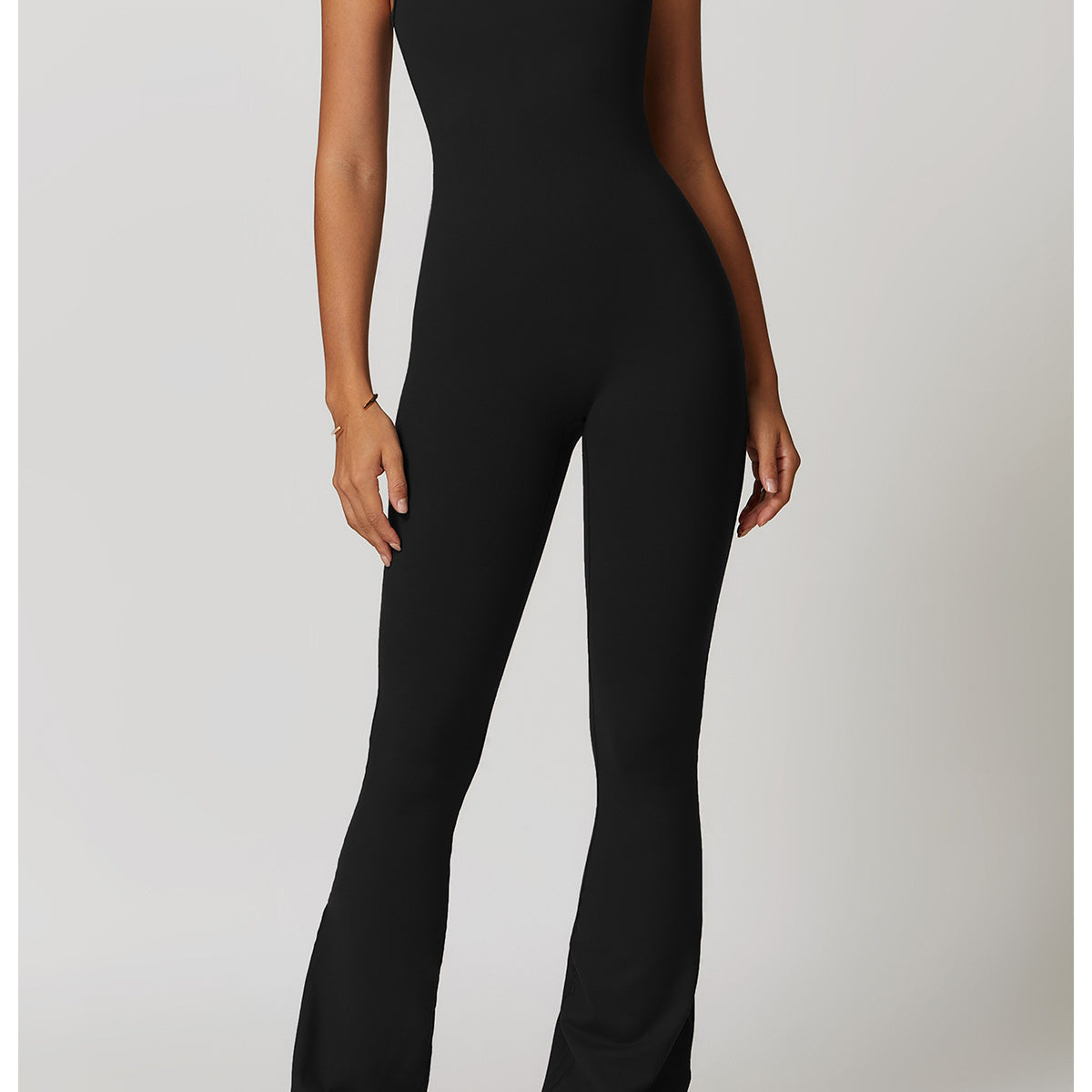 Black sleeveless flared-leg jumpsuit with square neckline ideal for Langry fashion ملابس