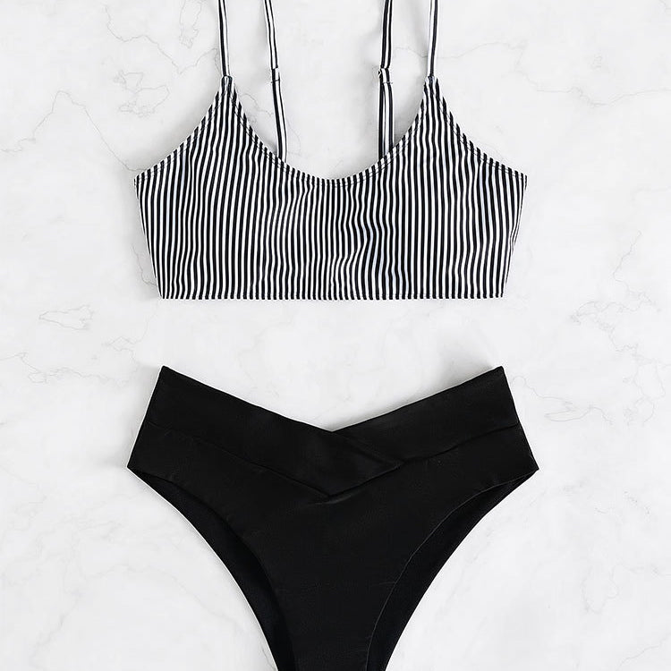 Striped high waist triangle bikini set with high-waisted bottoms for a stylish beach look