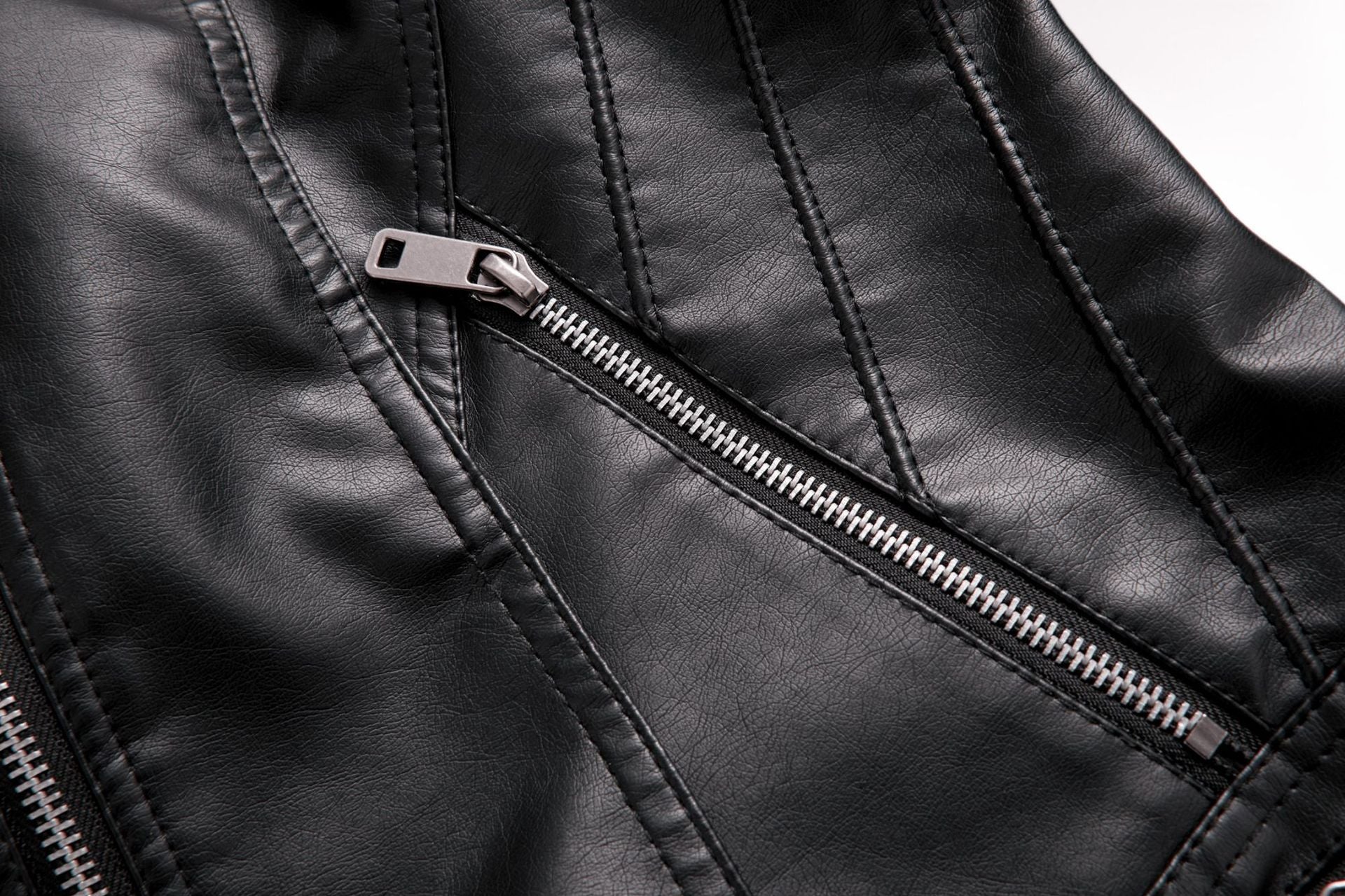 Black leather jacket detail with zipper showcasing luxurious langry fashion and stylish ملابس