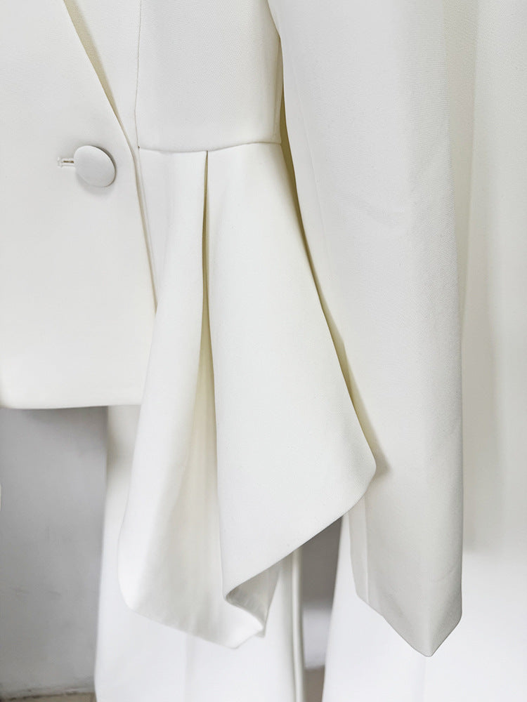 White asymmetrical pleated Langry fashion skirt with silver buttons