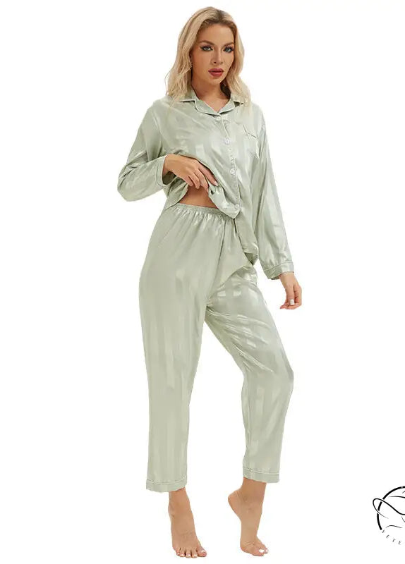 Sleek mint green langry fashion pajamas with bold stripes shirt and trousers