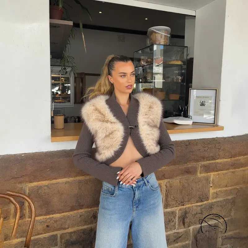 Brown fur-trimmed cropped cardigan coat with silver buttons and jeans