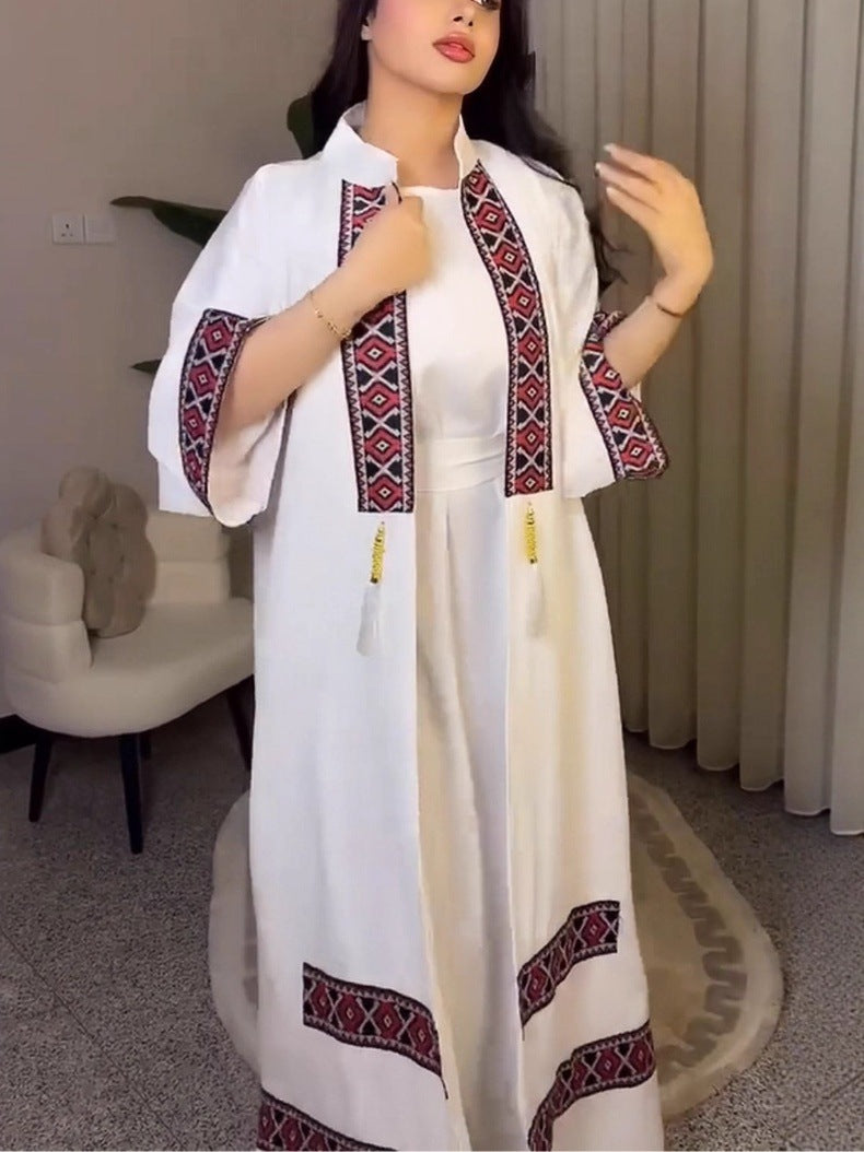 Langry fashion white embroidered cape dress with red black geometric patterns