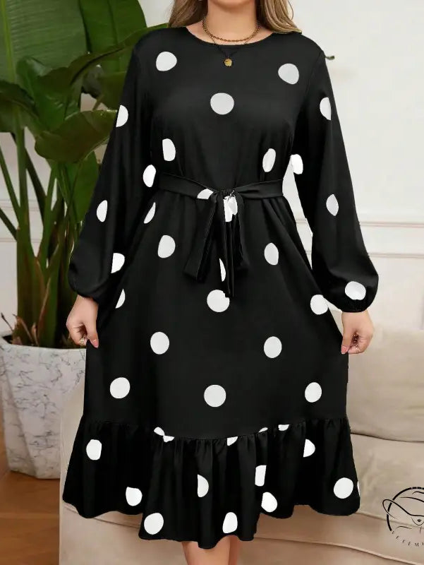Black polka dot lotus leaf dress with lace up hem and tie waist