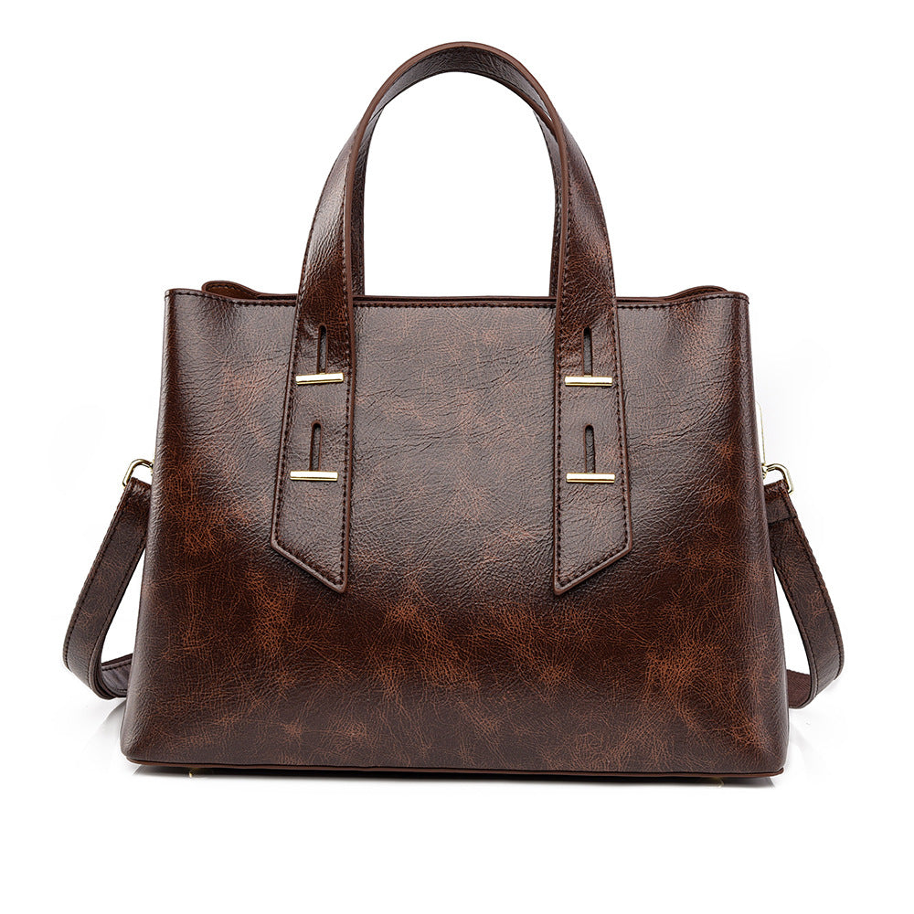 Langry fashion brown leather tote bag with silver hardware
