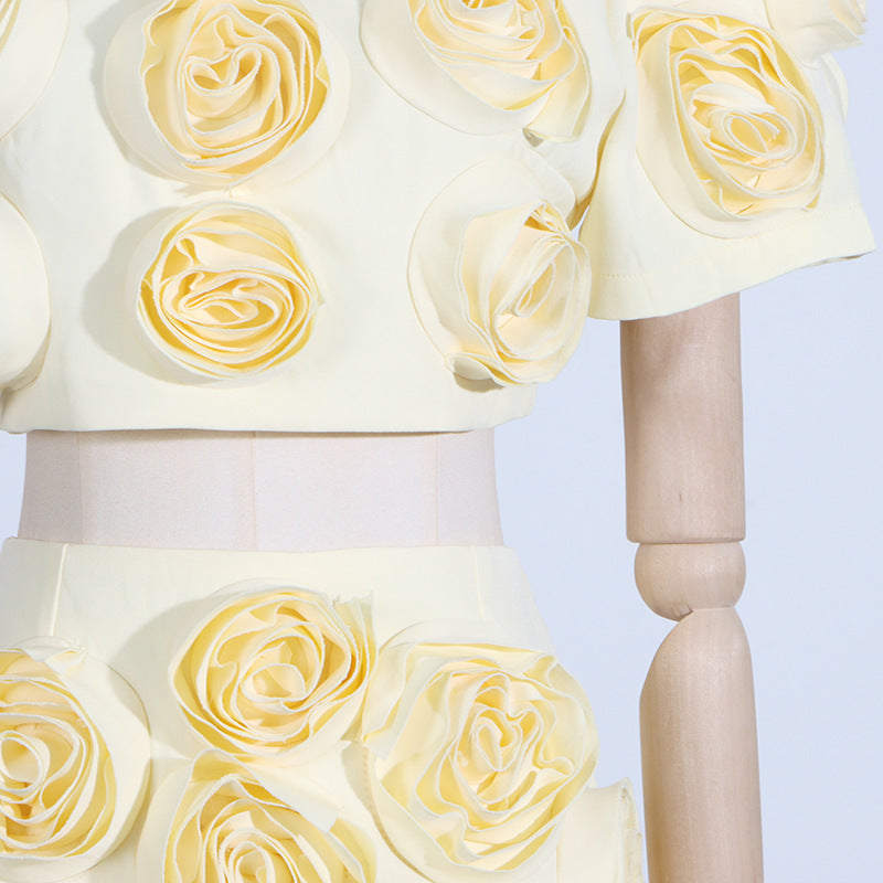 White wedding cake with cream fondant roses, reflecting French Sweet Summer fashion style