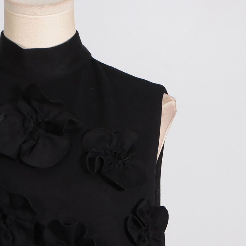 Black sleeveless top with floral embellishments featuring tie bow detail from Retro Socialite fashion collection