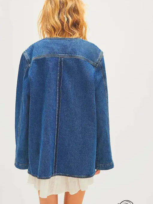 Woman in casual fashionable cowboy coat over ruffled dress