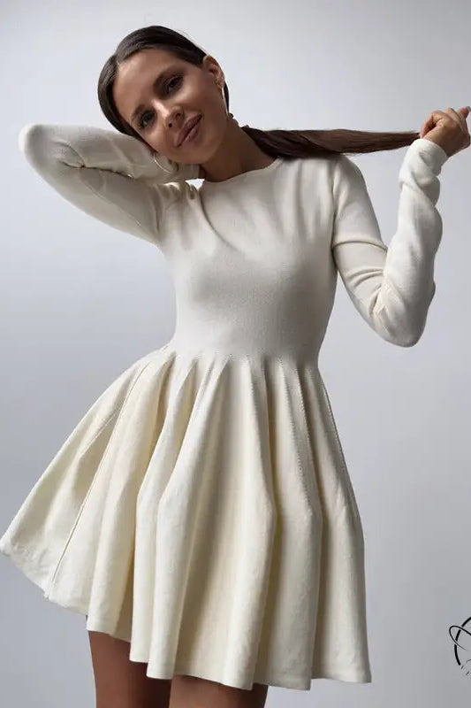 Beautiful woolen knitted fit-and-flare dress in cream
