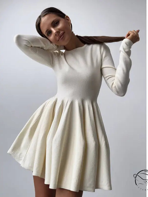 Beautiful woolen knitted fit-and-flare dress in cream