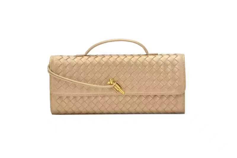 Beige woven leather clutch with handle from the Soft Leather Mid Ancient Baguette Bag collection