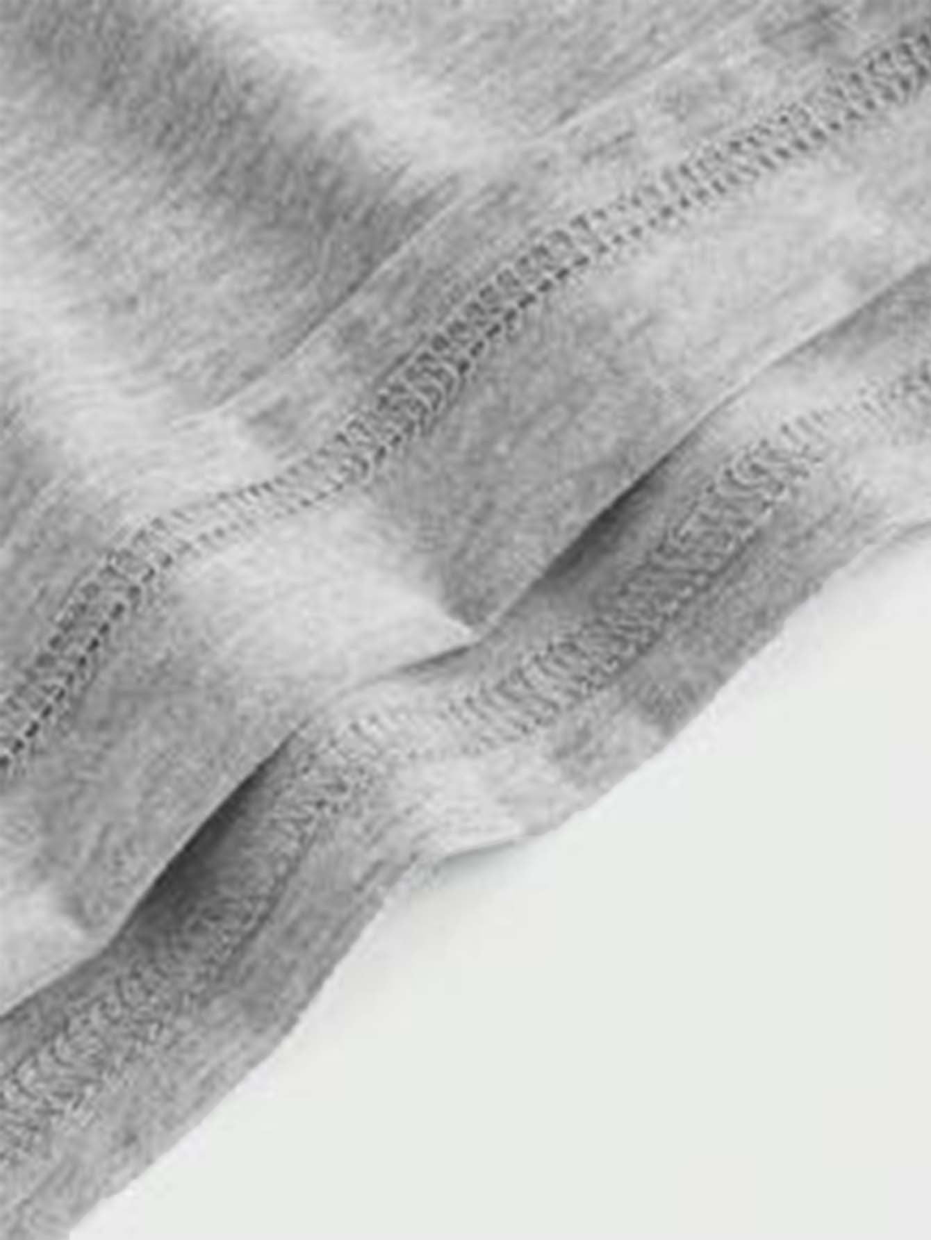 Gray fabric with visible stitching for Sling Bare Back Hip Dress, showcasing fashion and ملابس