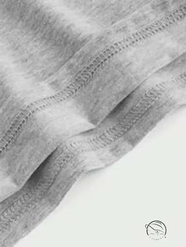 Gray sling bare back hip dress fabric with visible stitching