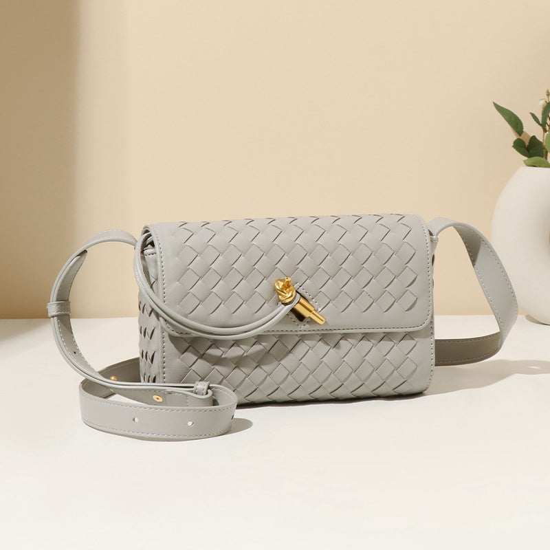 Gray woven leather crossbody bag with gold hardware for elegant fashion and ملابس