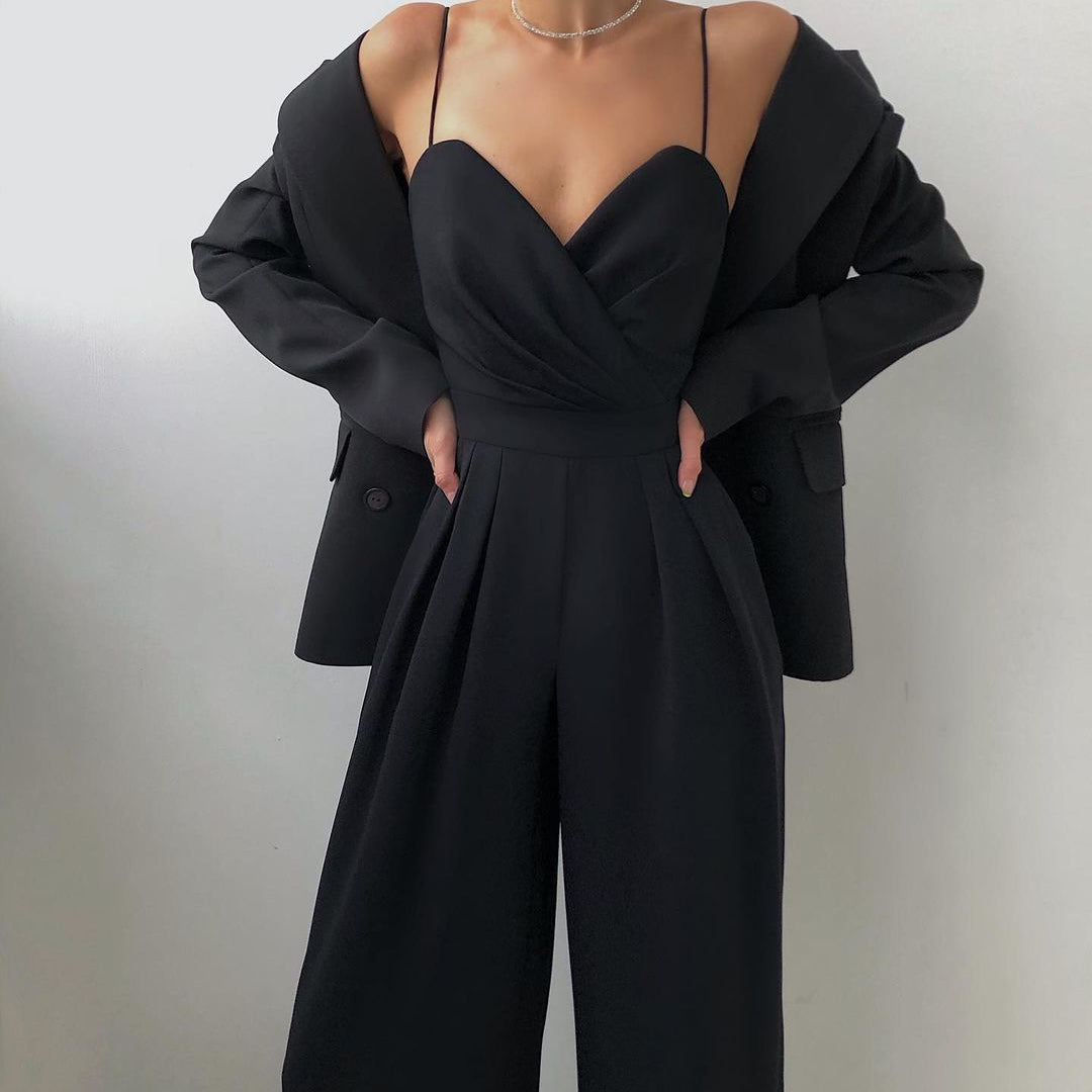 Elegant black strapless jumpsuit with wide-leg pants, perfect for modern fashion lovers