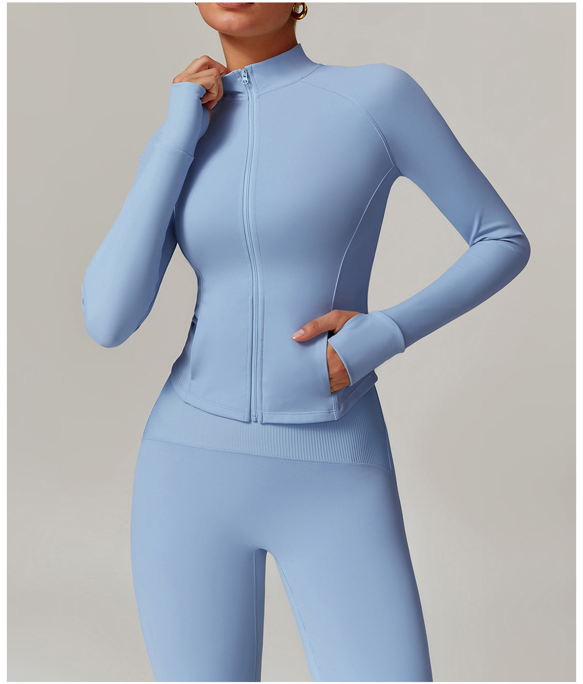 Light blue langry fitted workout set featuring a zip-front jacket and matching leggings
