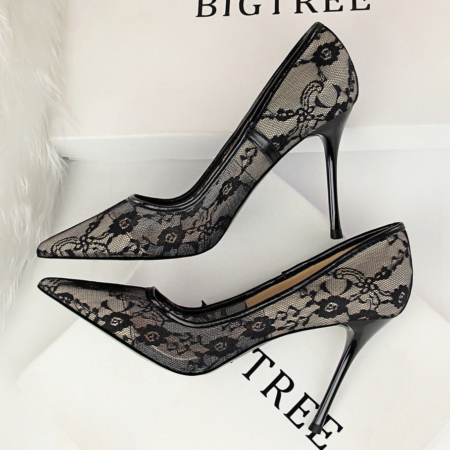 Black lace stiletto heels with pointed toe design, perfect for elegant fashion outfits