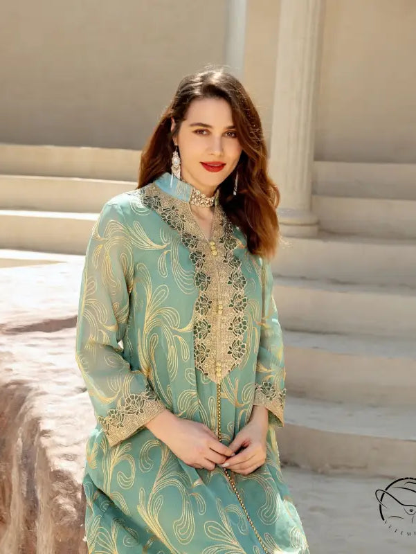Enchanting Middle East langry swing dress in mint green with gold floral embroidery
