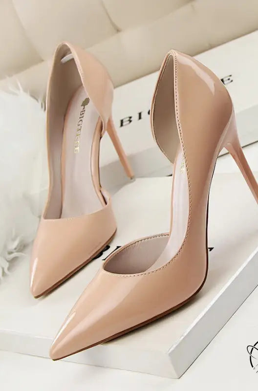 Nude patent leather low cut high heels with pointed stiletto toes