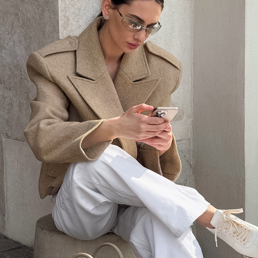 Beige Langry fashion trench coat with oversized lapels and button closure