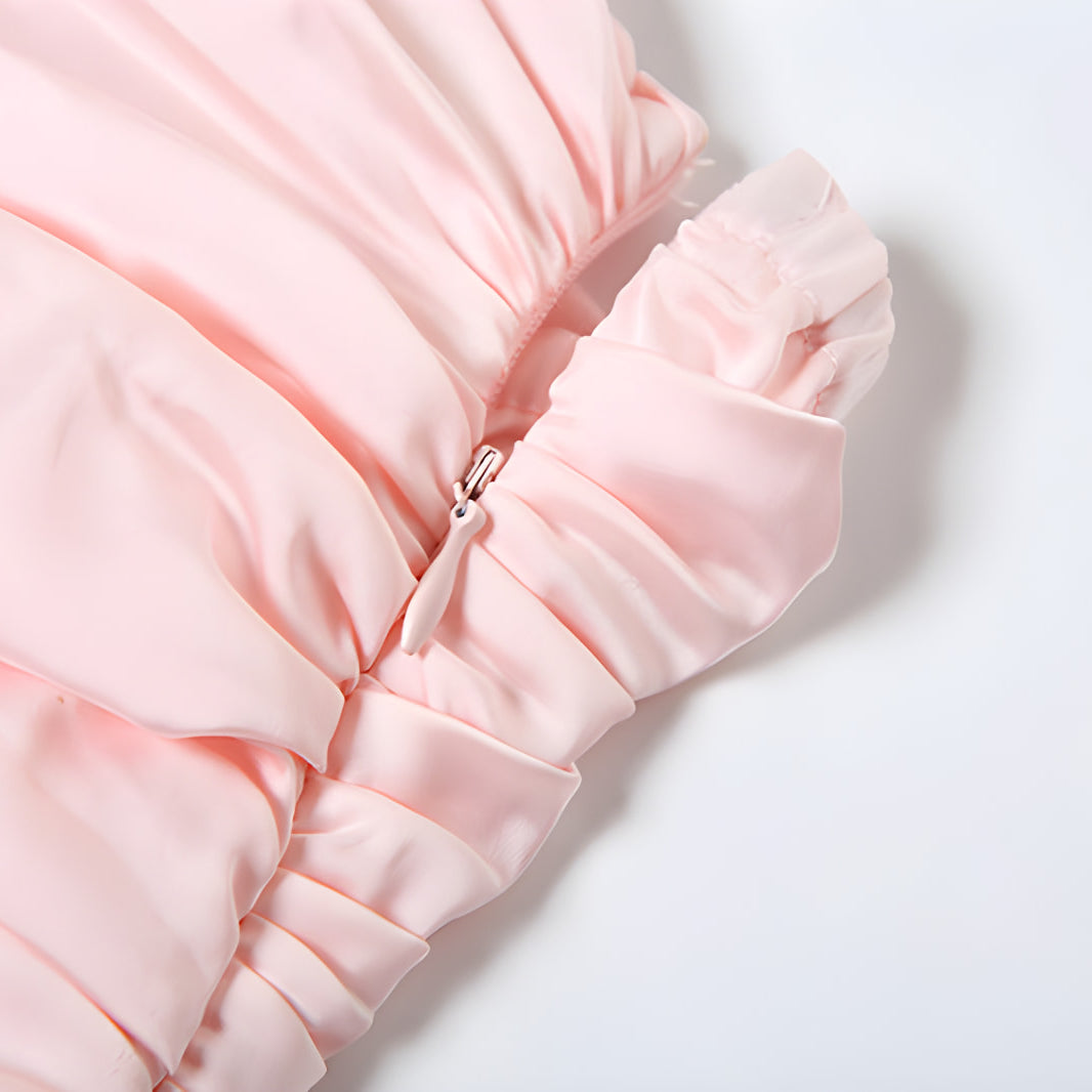 Pink ruffled fabric with delicate gathers in a fashionable backless Bud dress for women