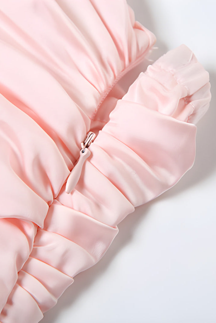 Pink ruffled fabric with delicate gathers in a fashionable backless Bud dress for women