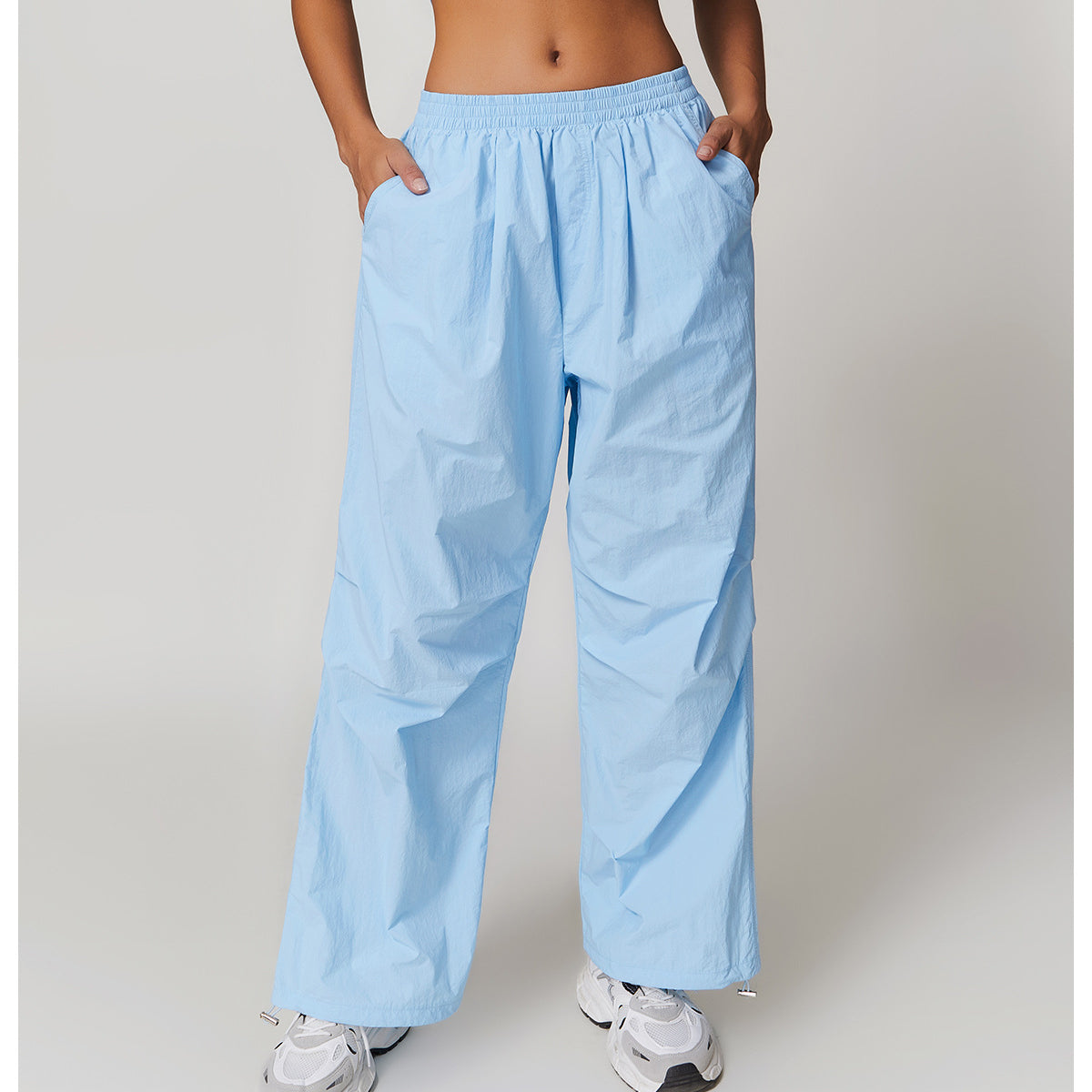 Light blue drawstring pants for casual sports, ideal for fitness and fashion enthusiasts