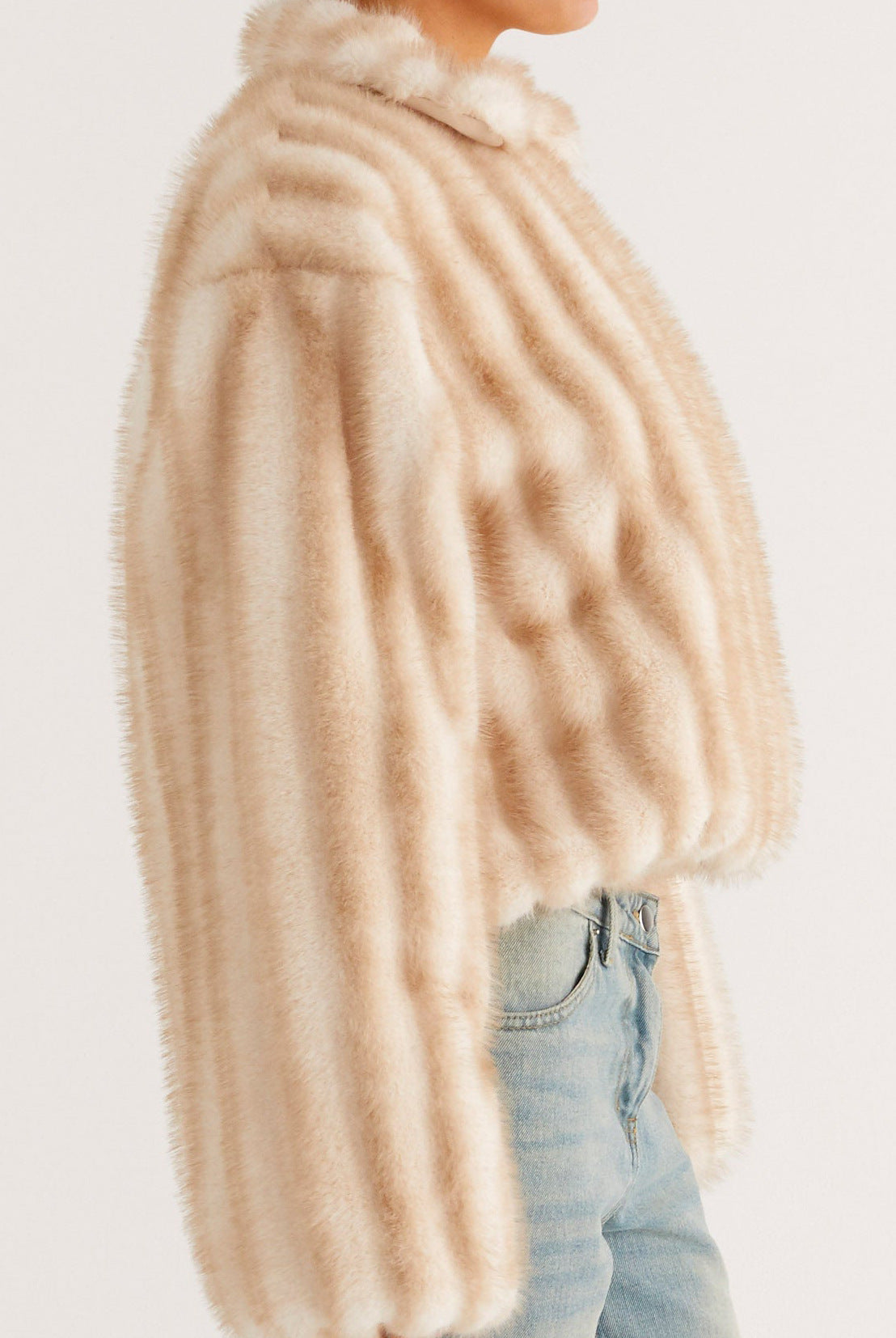 Cream faux fur oversized coat with ribbed texture and high collar