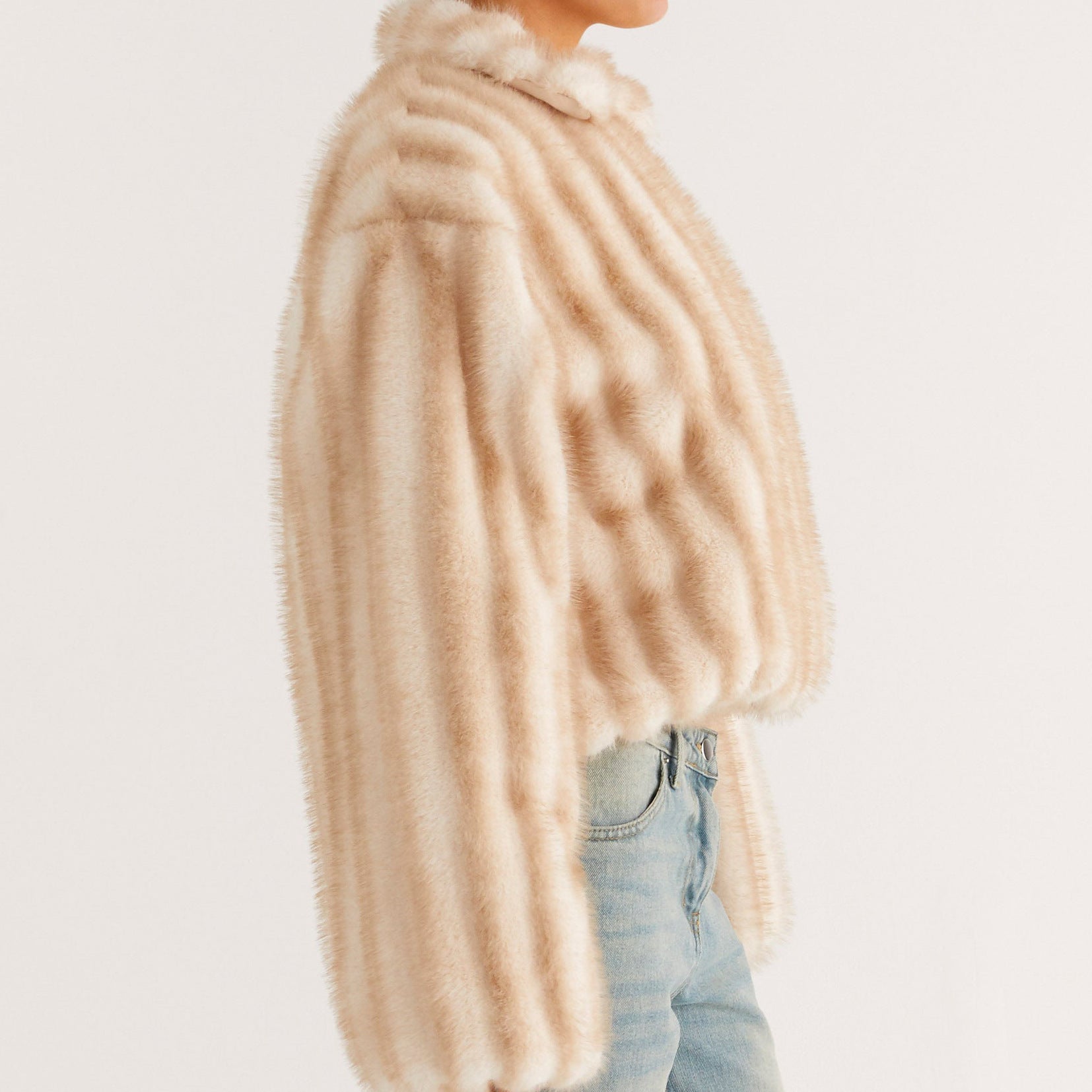Cream faux fur oversized coat with ribbed texture and high collar