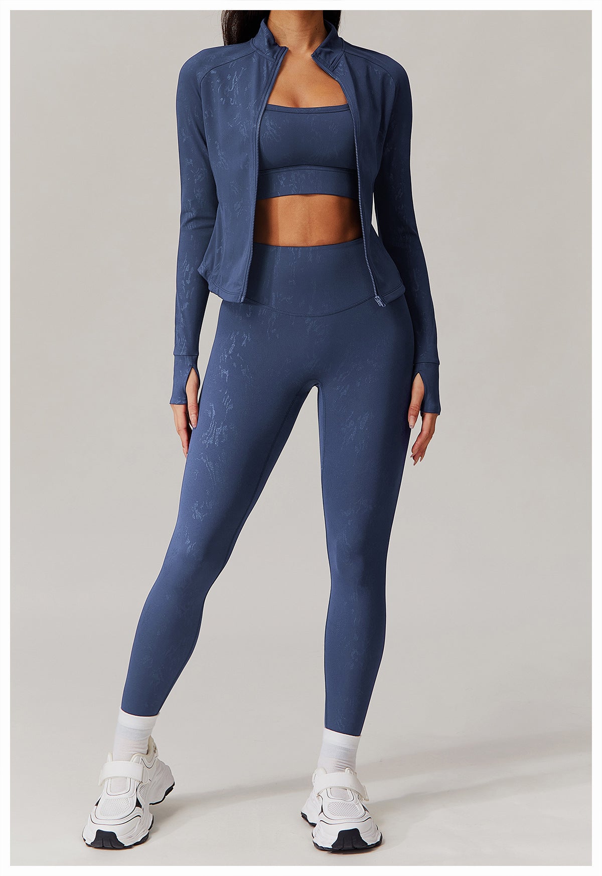 Navy blue women’s athletic set with textured patterns, thumbholes, ideal for langry fashion and ملابس