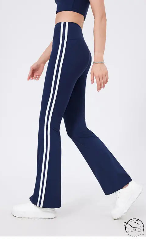 Navy blue high waist yoga pants with white stripes and peach hip raise