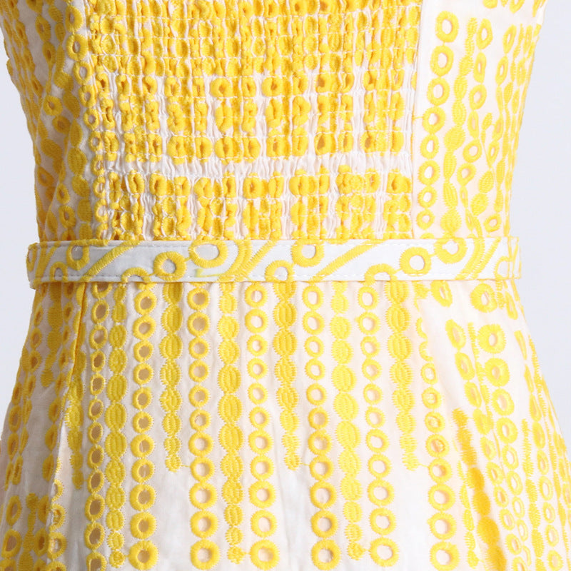Yellow and white summer dress with ruffle details, perfect for seasonal fashion ملابس