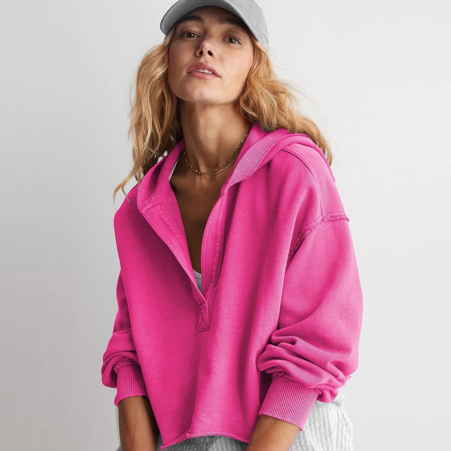 Hot pink cropped hoodie sweatshirt with ribbed cuffs in trendy fashion ملابس design