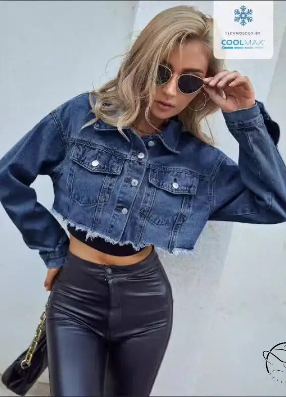 Woman in matching denim short coat with leather pants