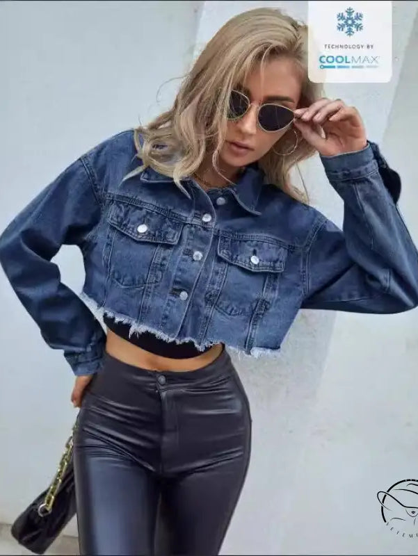 Woman in matching denim short coat with leather pants