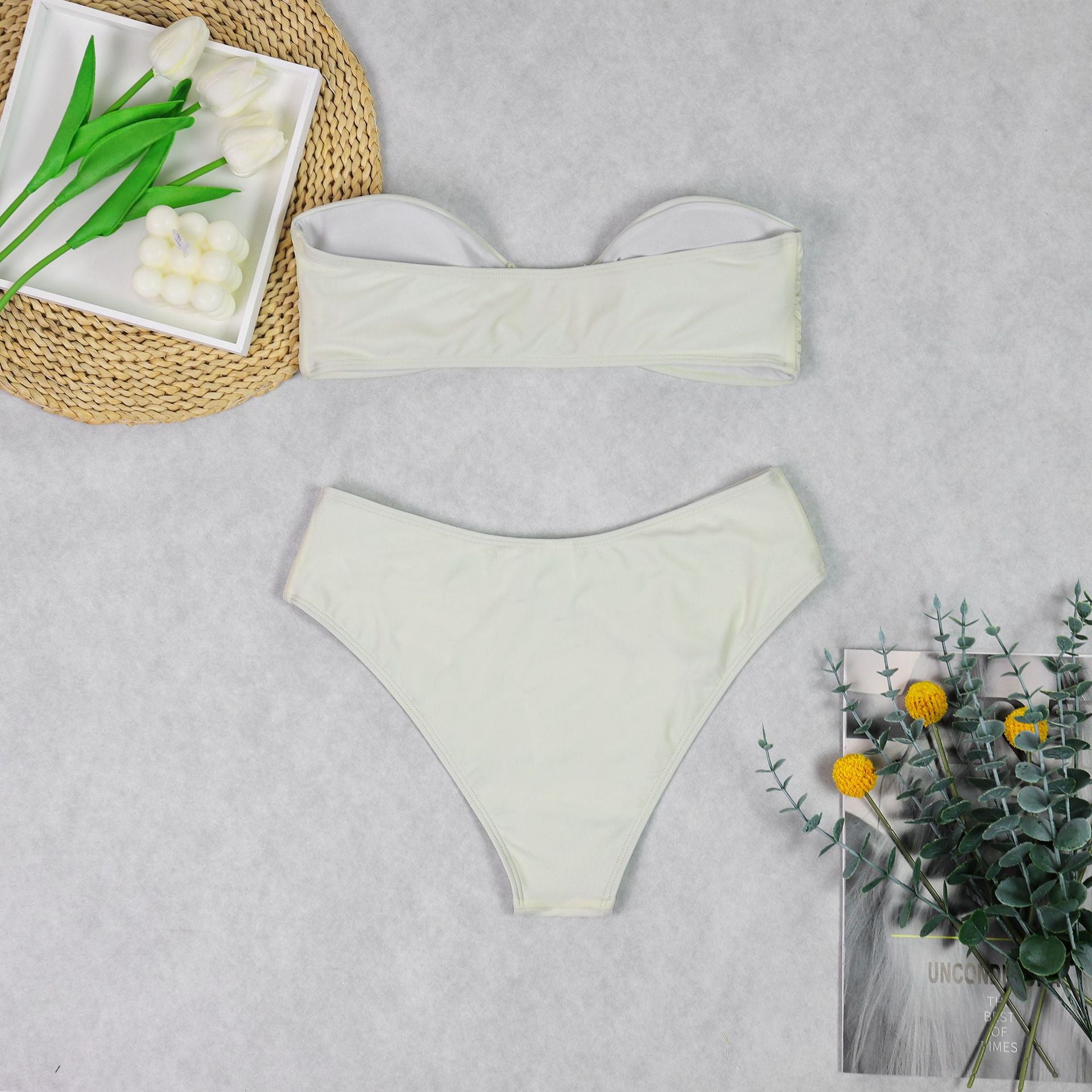 Gorgeous White Tube Top Bikini featuring a bandeau top and high-cut bottom for fashionable swimwear