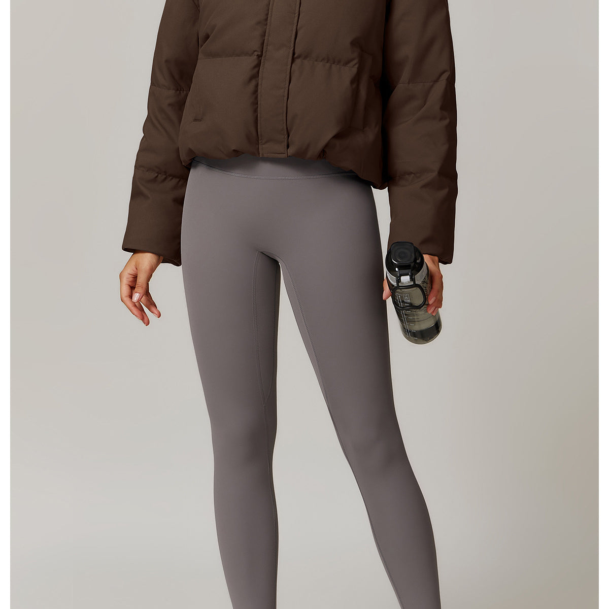 Brown puffer jacket from Comfortably Warm Jacket collection showcasing stylish fashion ملابس