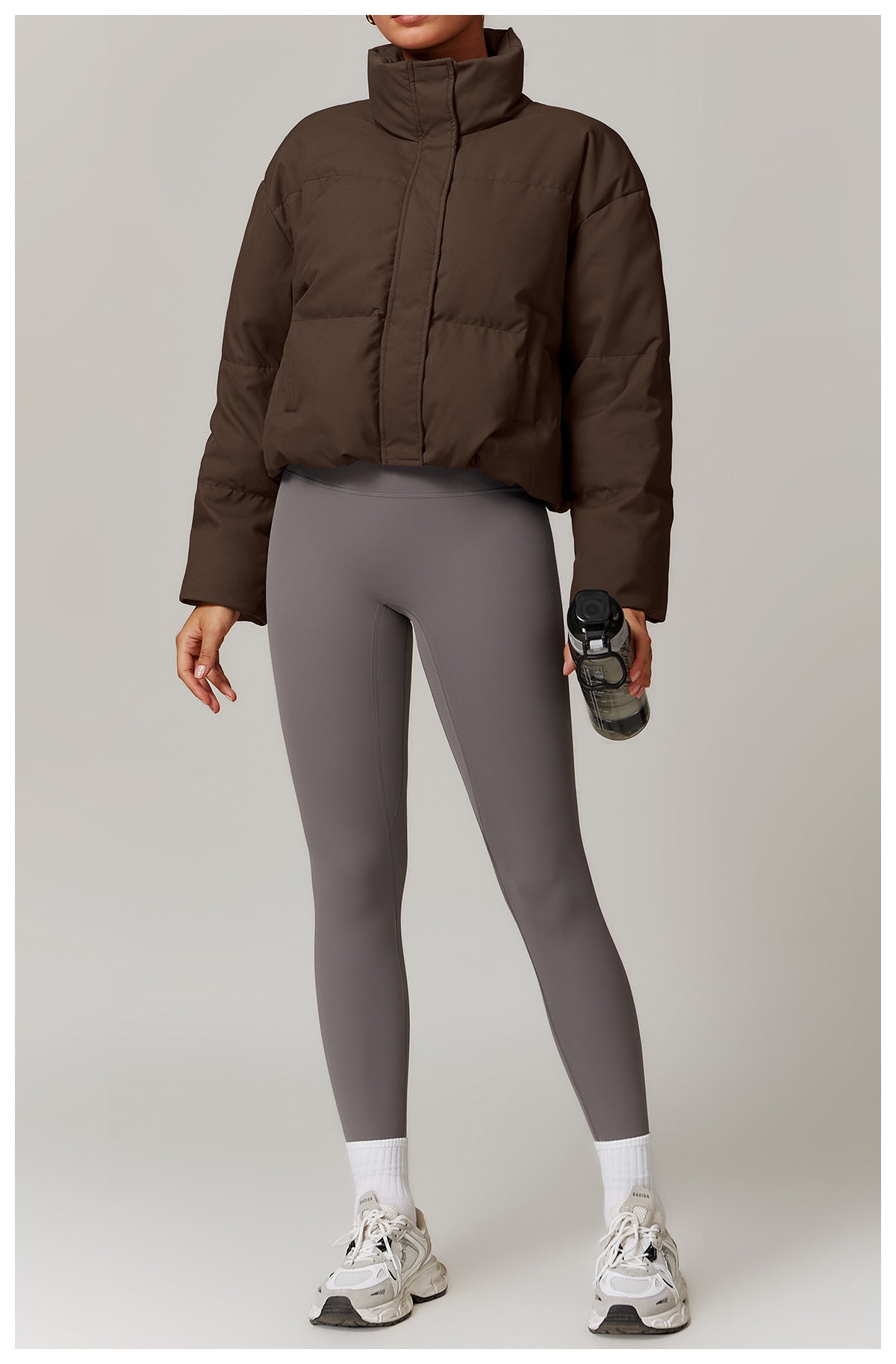 Brown puffer jacket from Comfortably Warm Jacket collection showcasing stylish fashion ملابس