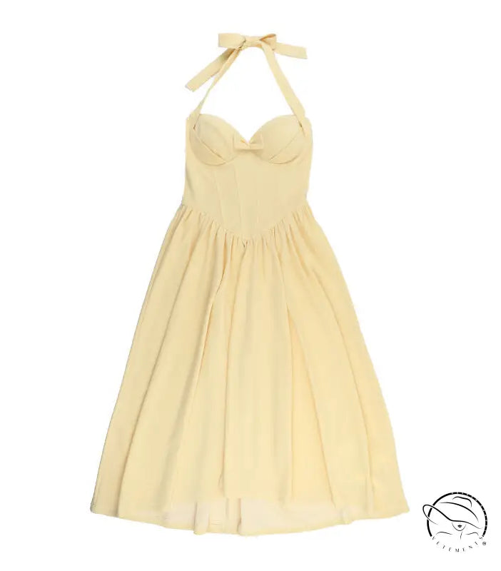 Elegant yellow halter neck langry fashion maxi dress with back bow detail