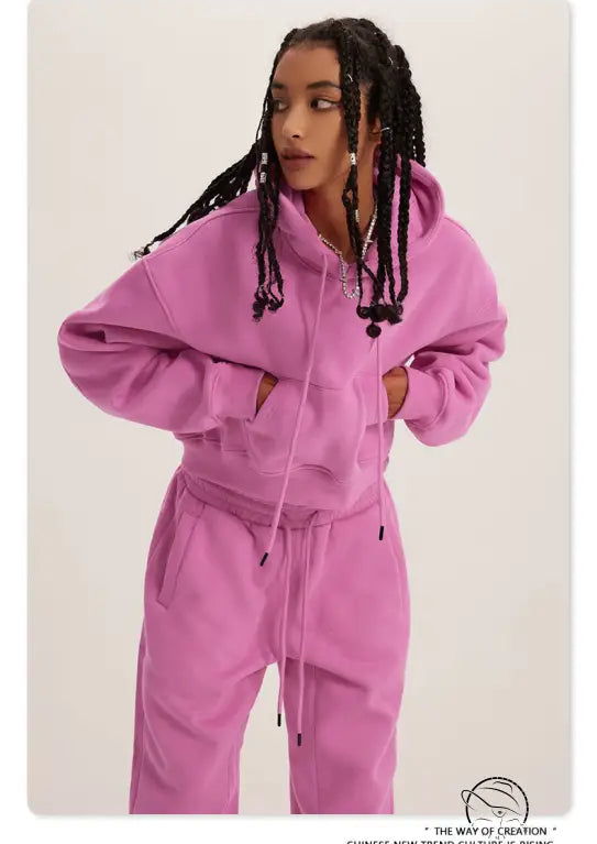 Langry pink zip-up hooded sweatsuit with matching jogger pants in winter retro fashion