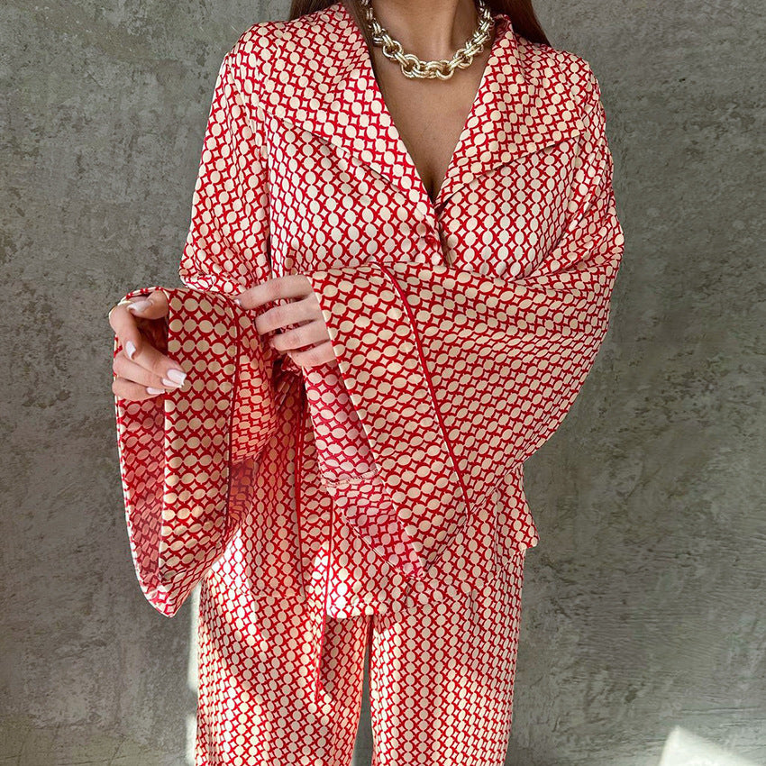 Red and white patterned long-sleeved pajamas with a gold chain necklace for casual comfortable homewear