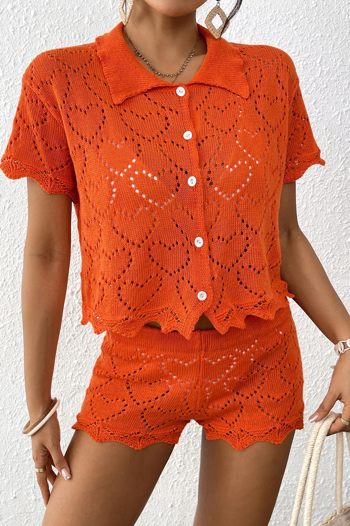 Orange knit shorts set from Beautiful Beach Sets, perfect for summer fashion