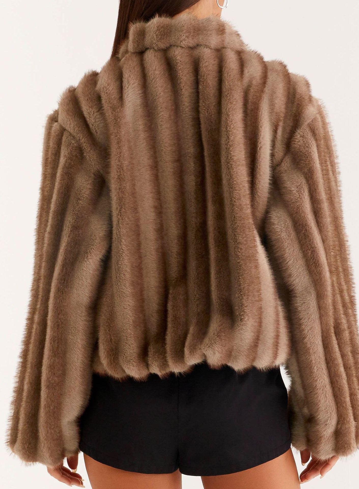 Loose warm furry jacket in brown faux fur with ribbed detailing and high collar
