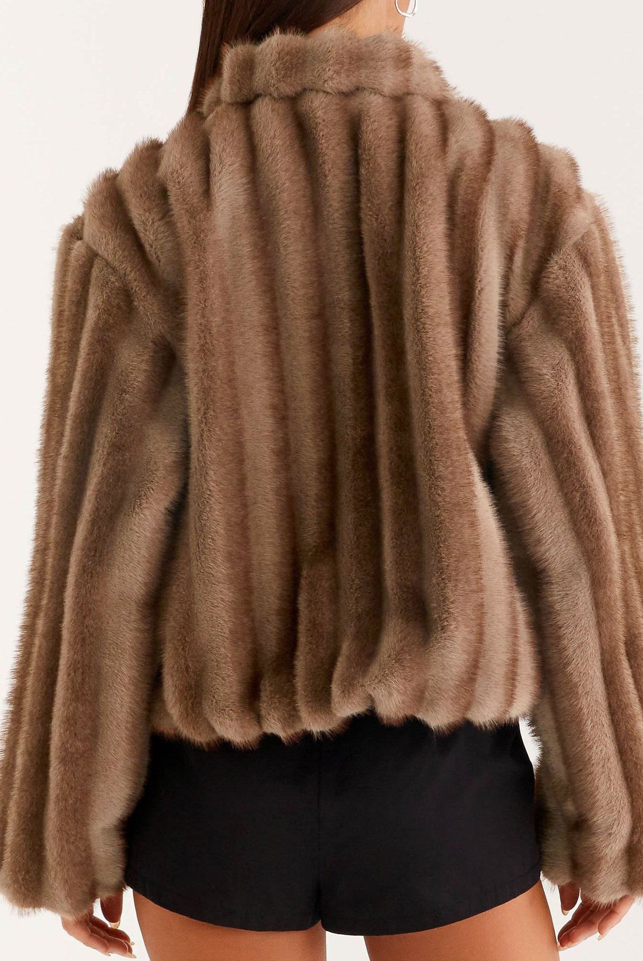 Loose warm furry jacket in brown faux fur with ribbed detailing and high collar