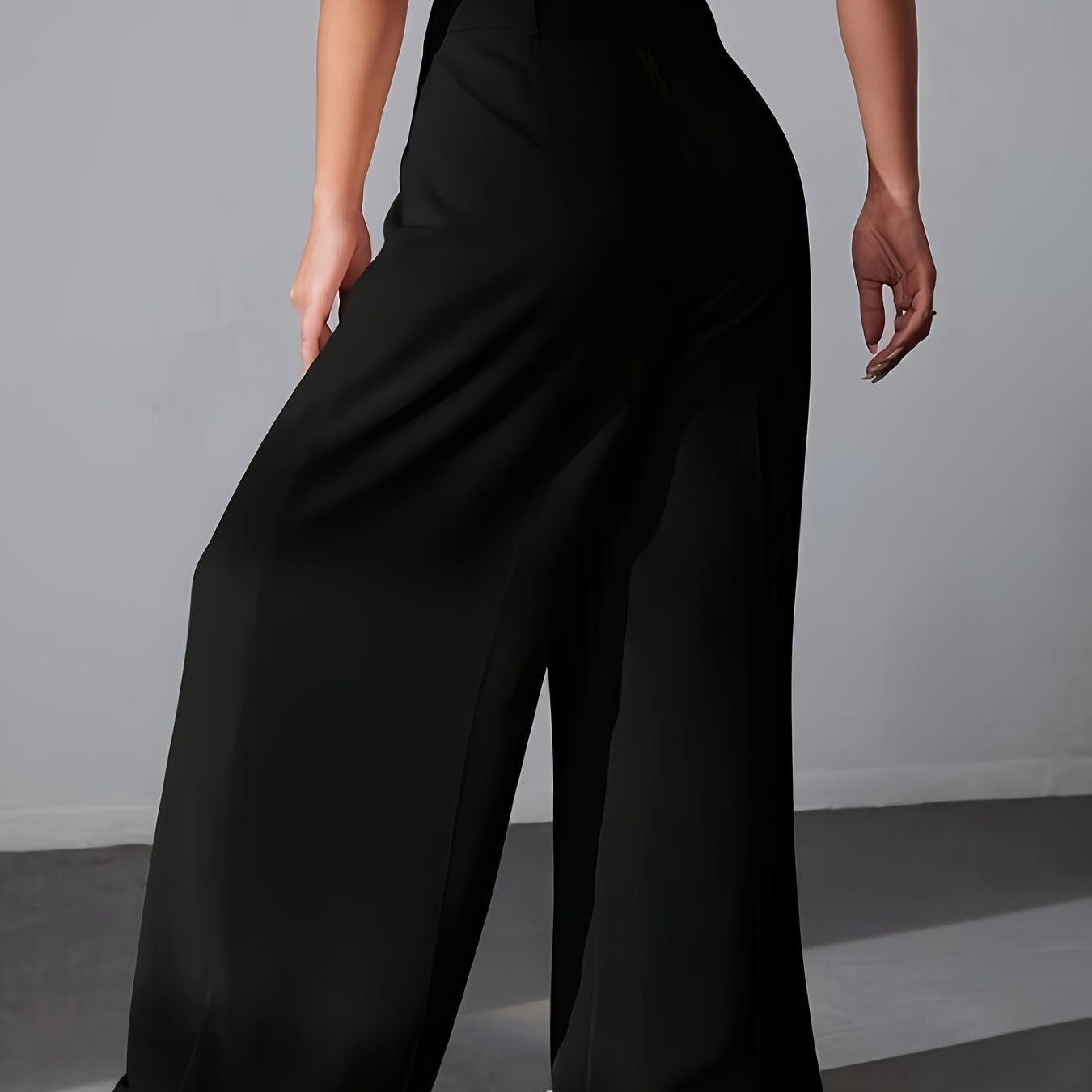 Black wide leg palazzo pants with a cropped white top for chic fashion styling